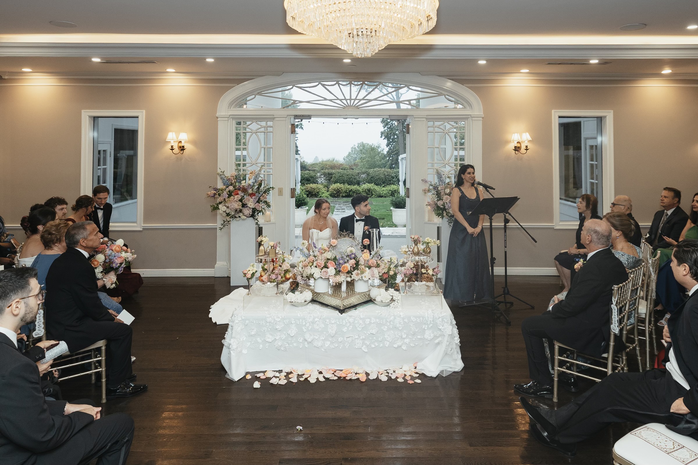 Giovanna and Milad exchange vows during their indoor ceremony